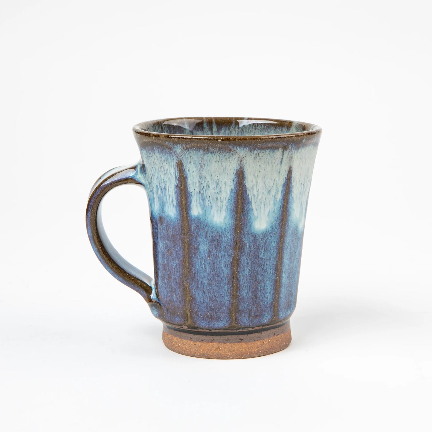 Side view of the Blue Shodai Mug showing its handle and hand-applied gradient glaze details.