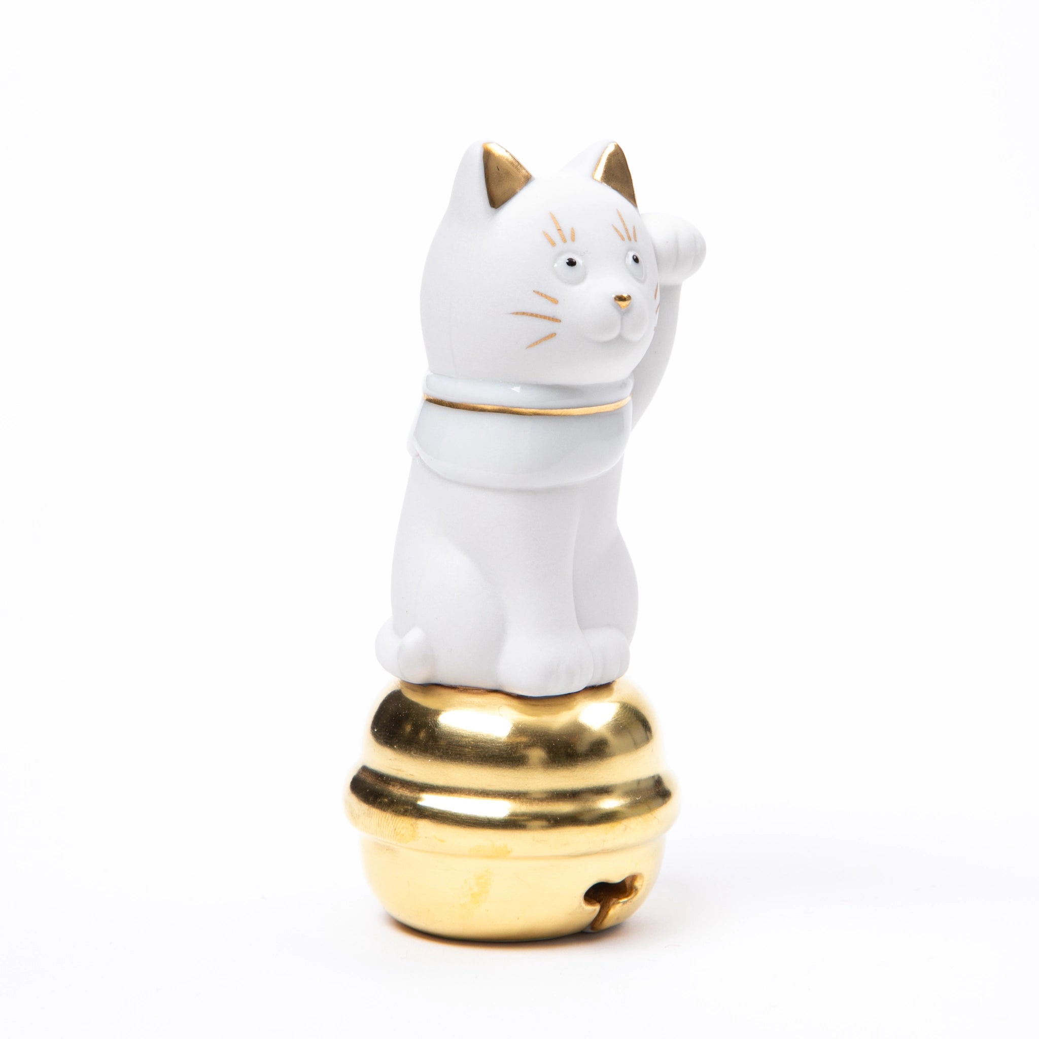 A side profile of the Choemon Kiln Kutani Maneki Neko, highlighting its delicate porcelain craftsmanship and intricate gold detailing on the face and collar.