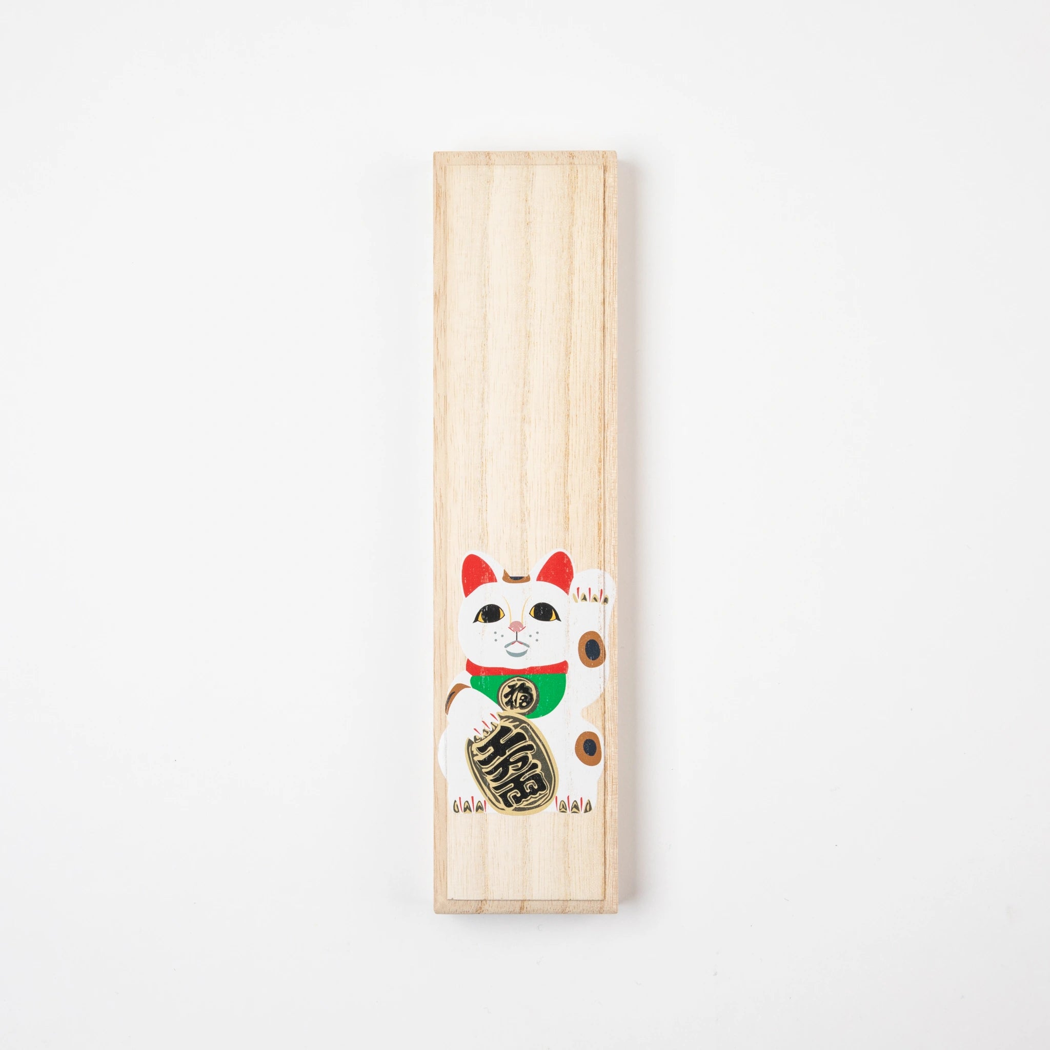 Closed paulownia wood gift box with a detailed illustration of a Maneki-neko and vibrant gold accents.