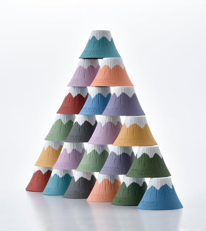 Stacking various color of Hasami Ware Ceramic Mt. Fuji coffee filter, shaping like a mountaing