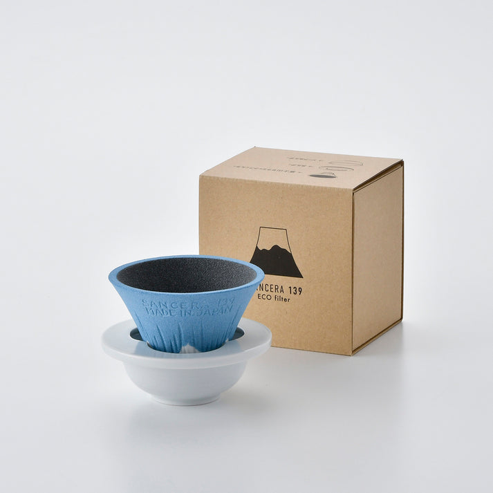 Placing the Hasami ware ceramit Mt. Fuji coffee filter on holder and saucer