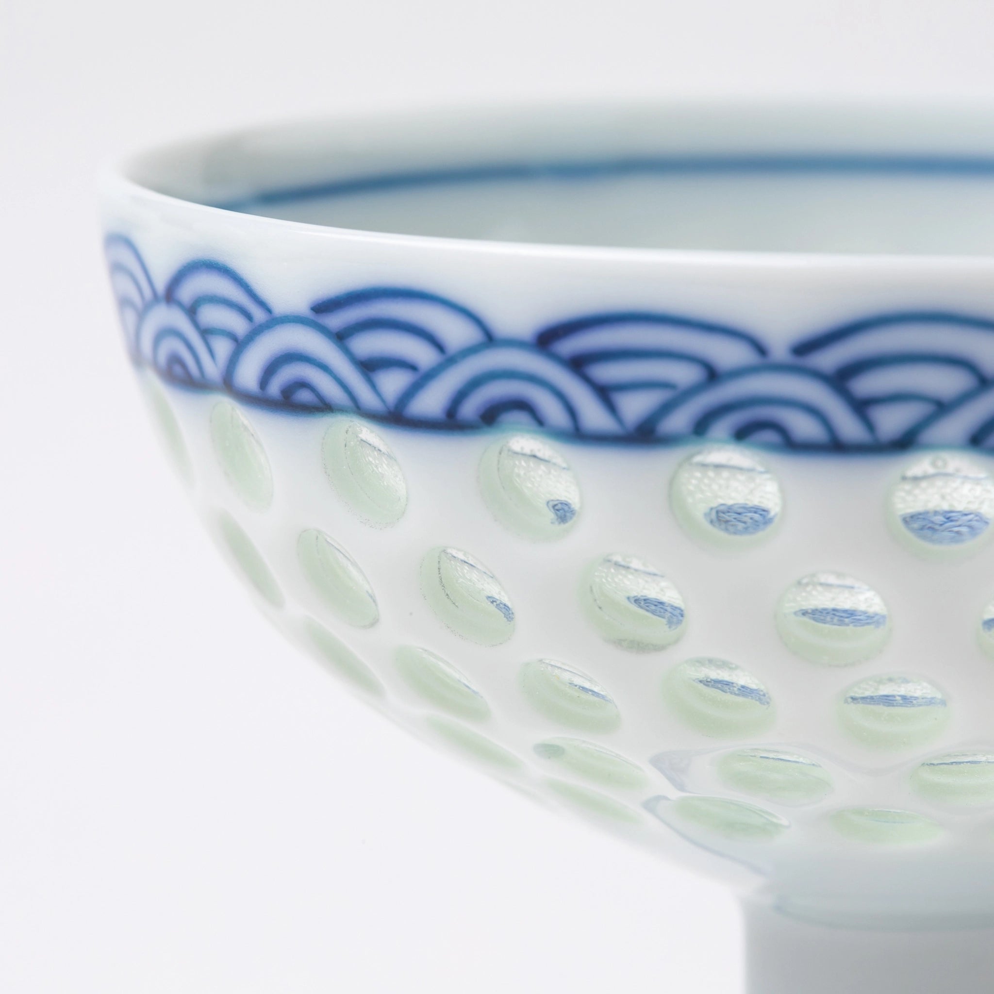 Close-up of the Tanshingama Goblet showing celadon dots and wave pattern detail.