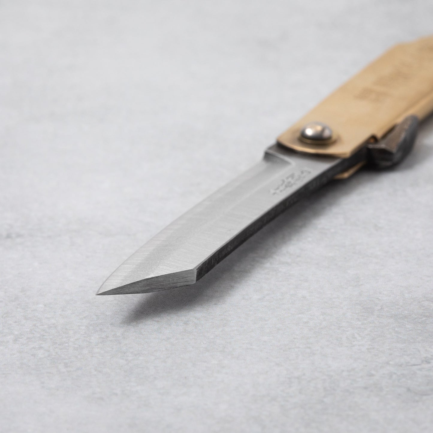 Blade tip of Higonokami Blue Super Steel Clad Medium Folding Knife