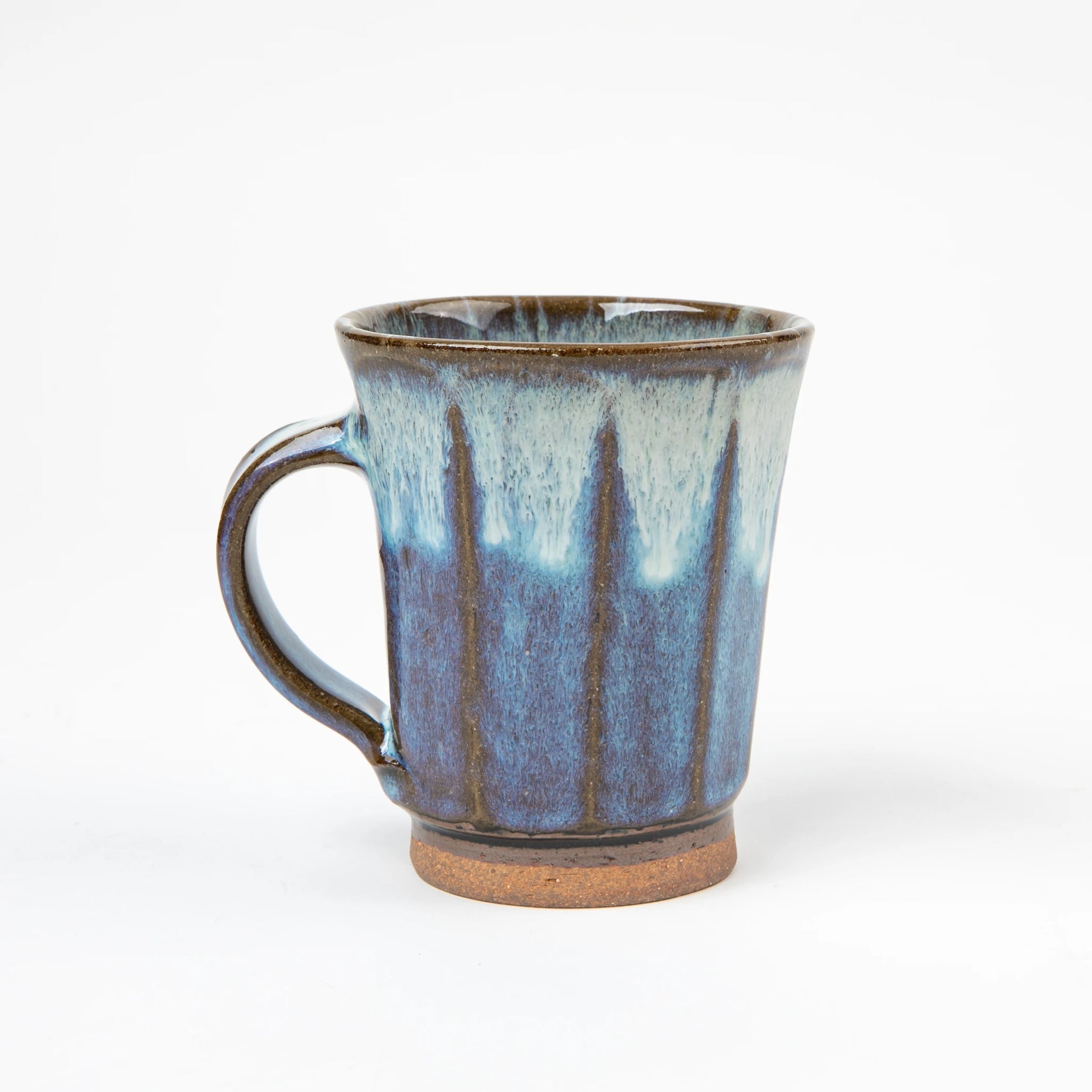 Side view of the Blue Shodai Mug showing its handle and hand-applied gradient glaze details.