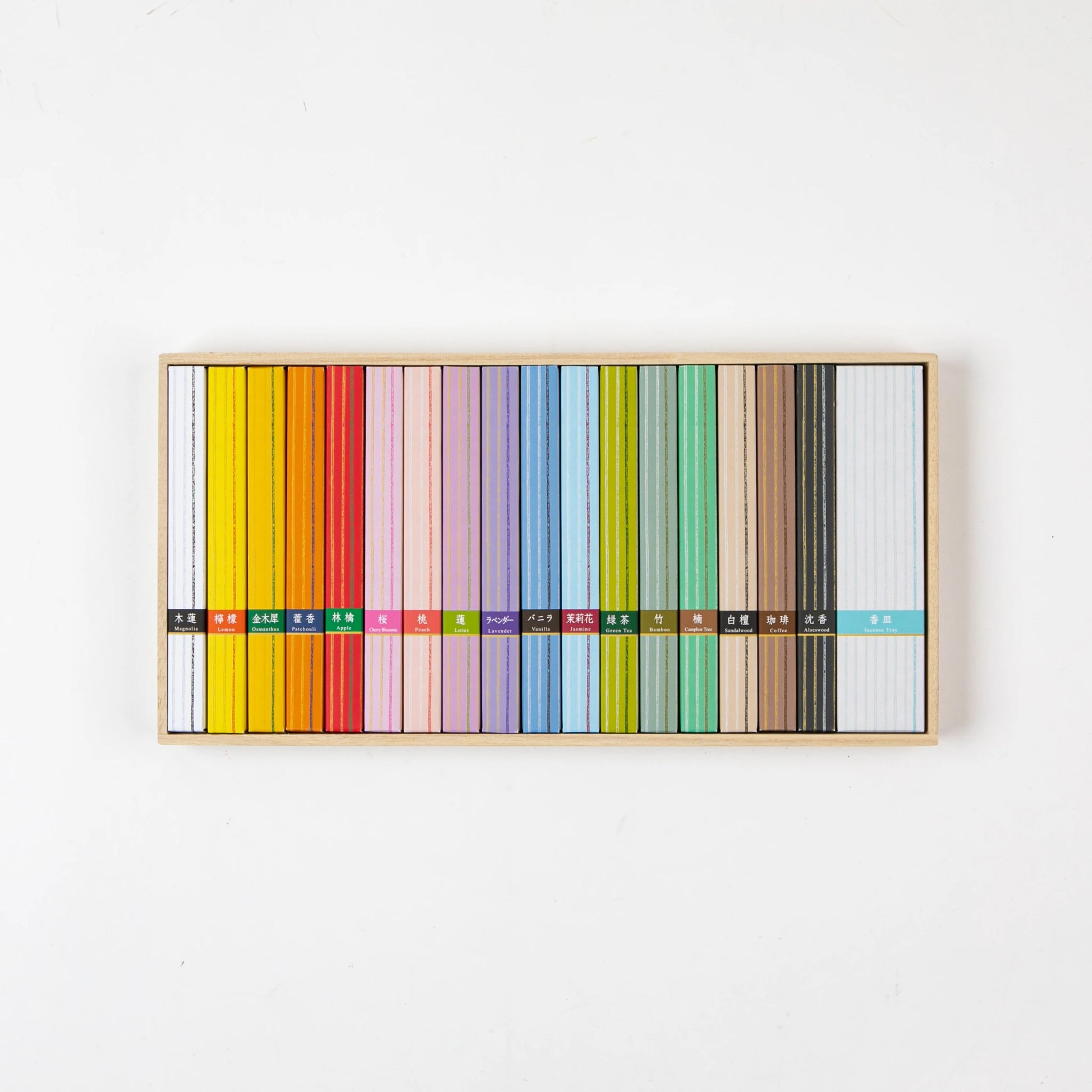 Open box of Kosaido Hyakuraku-kou incense displaying a colorful array of assorted incense sticks neatly arranged by scent.