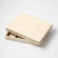 Natural wood storage gift box for MASTERSCRAFT chopstick rests, shown partially open with divided compartments.