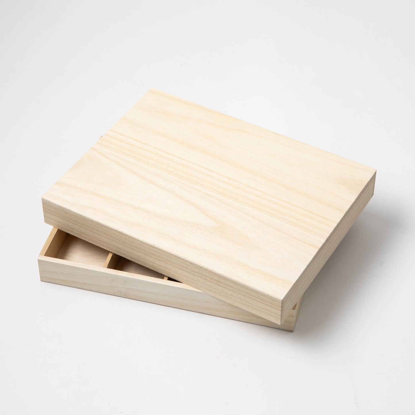 Natural wood storage gift box for MASTERSCRAFT chopstick rests, shown partially open with divided compartments.