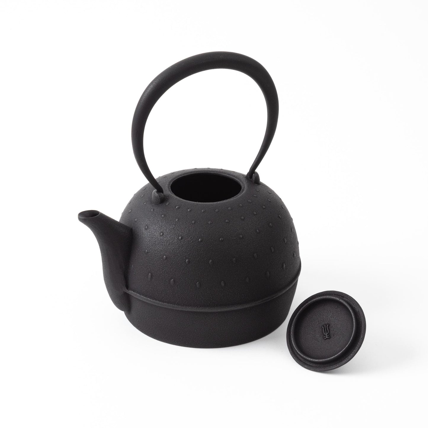 Classic Arare black Nambu cast iron teapot with lid removed, revealing the spacious interior - premium Japanese tea ware.