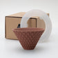 Sancera Hasami ware ceramic coffee filter in brown together with holder