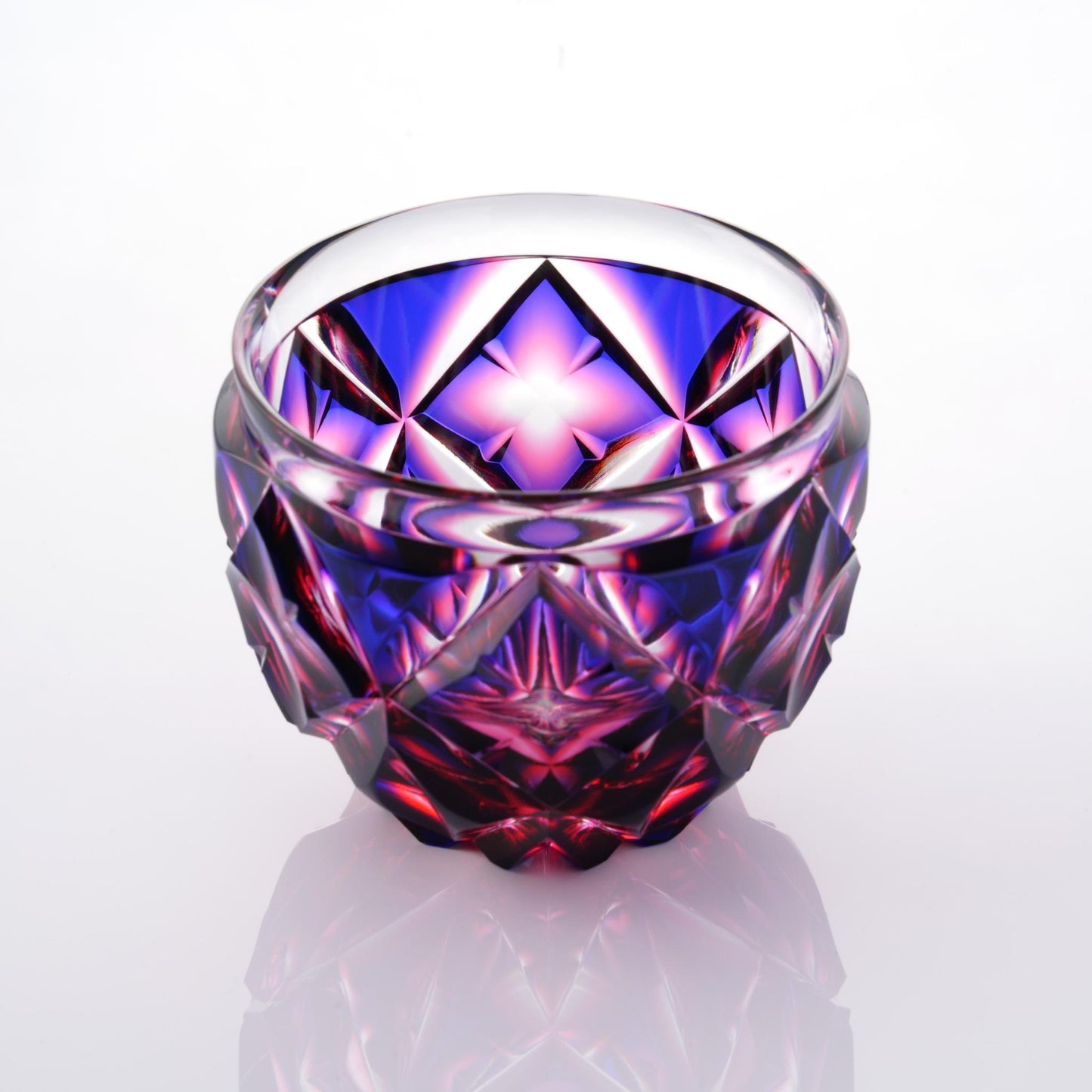 Satsuma Kiriko Lapis Red sake cup showcasing geometric patterns in red and blue.